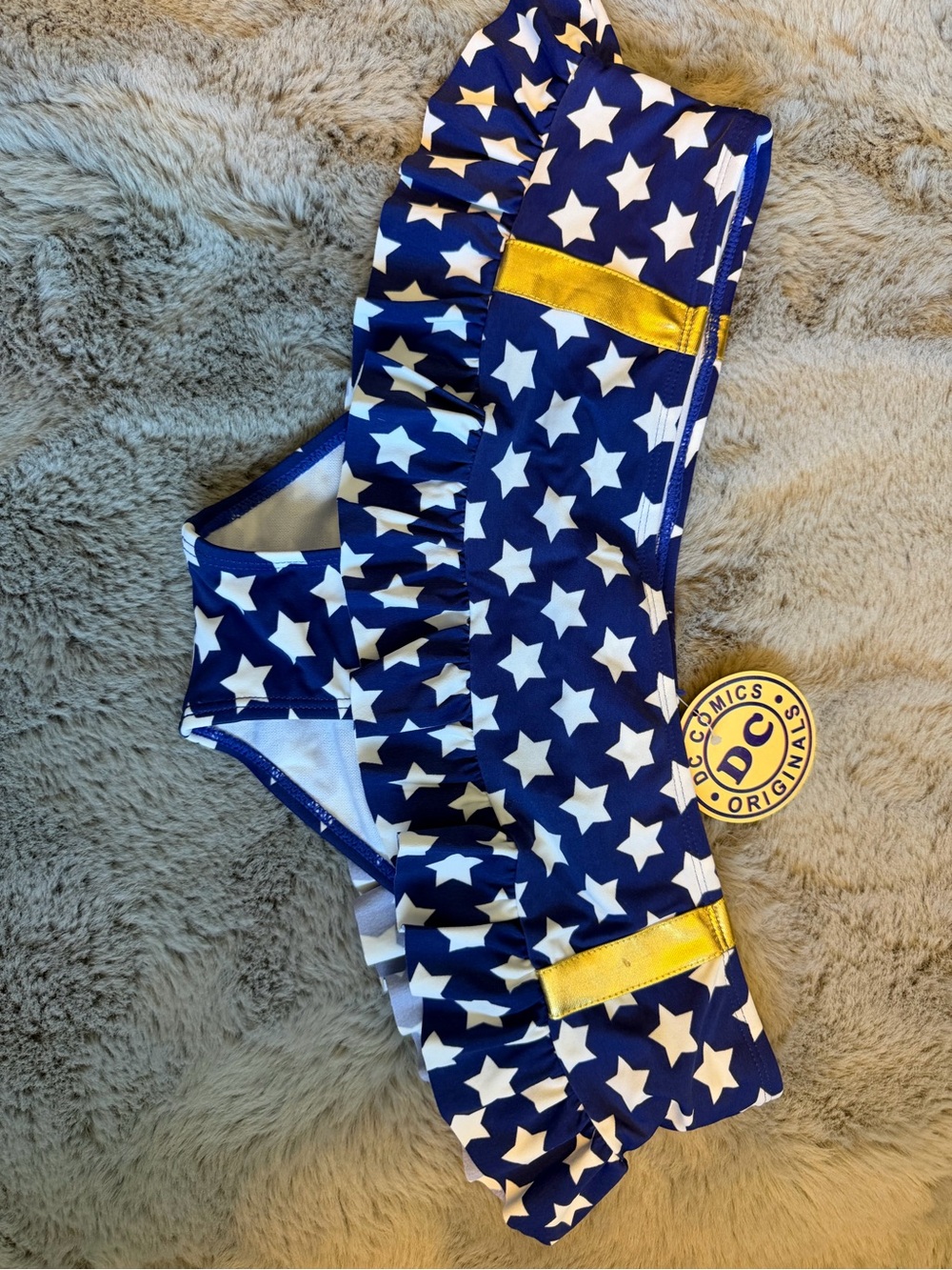 DC Comics Wonder Woman’s Navy Star Ruffle Swim Bottoms with Gold Accent
